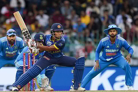 Dunith Wellalage plays a shot against India